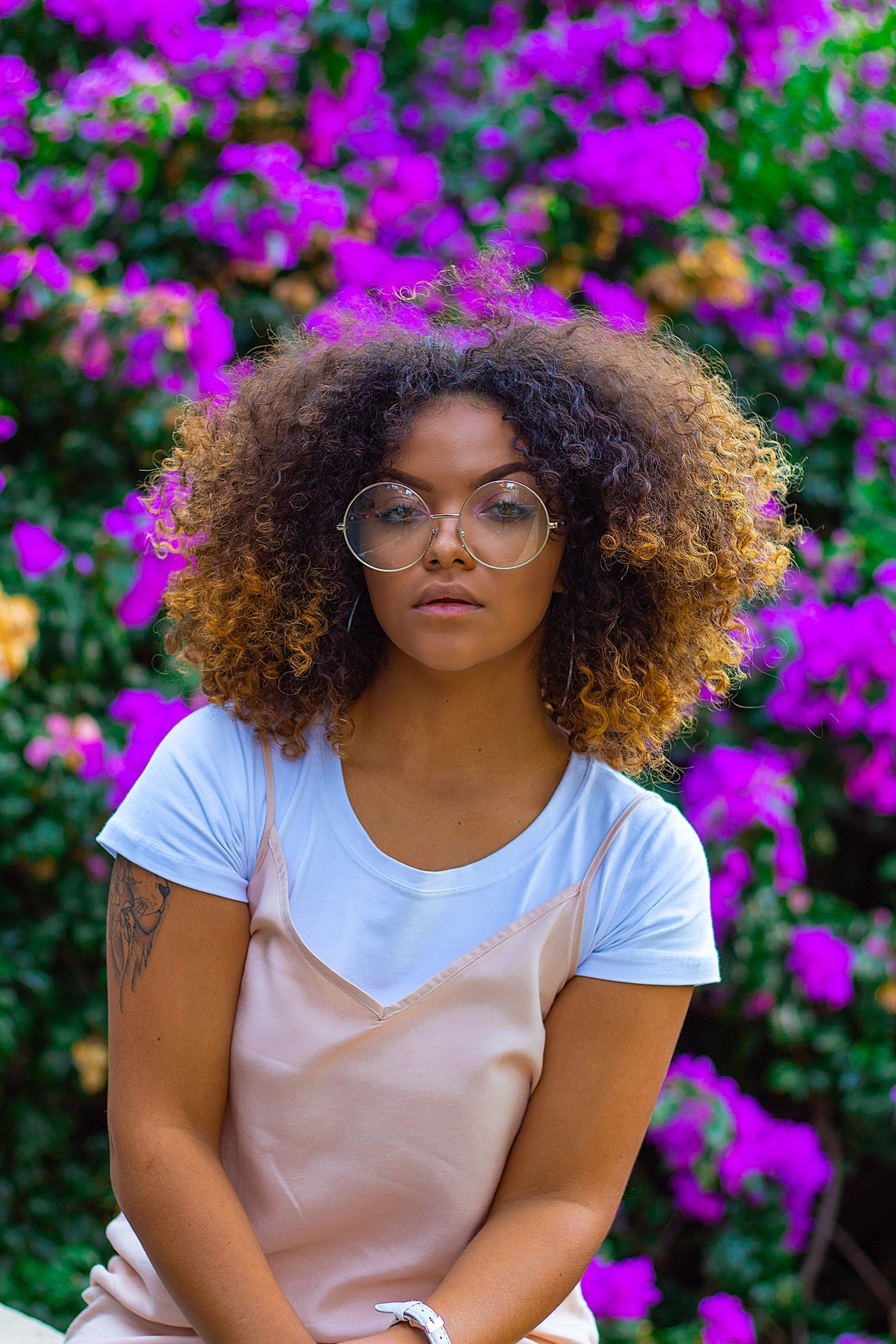 Trendy young lady wearing cool glasses